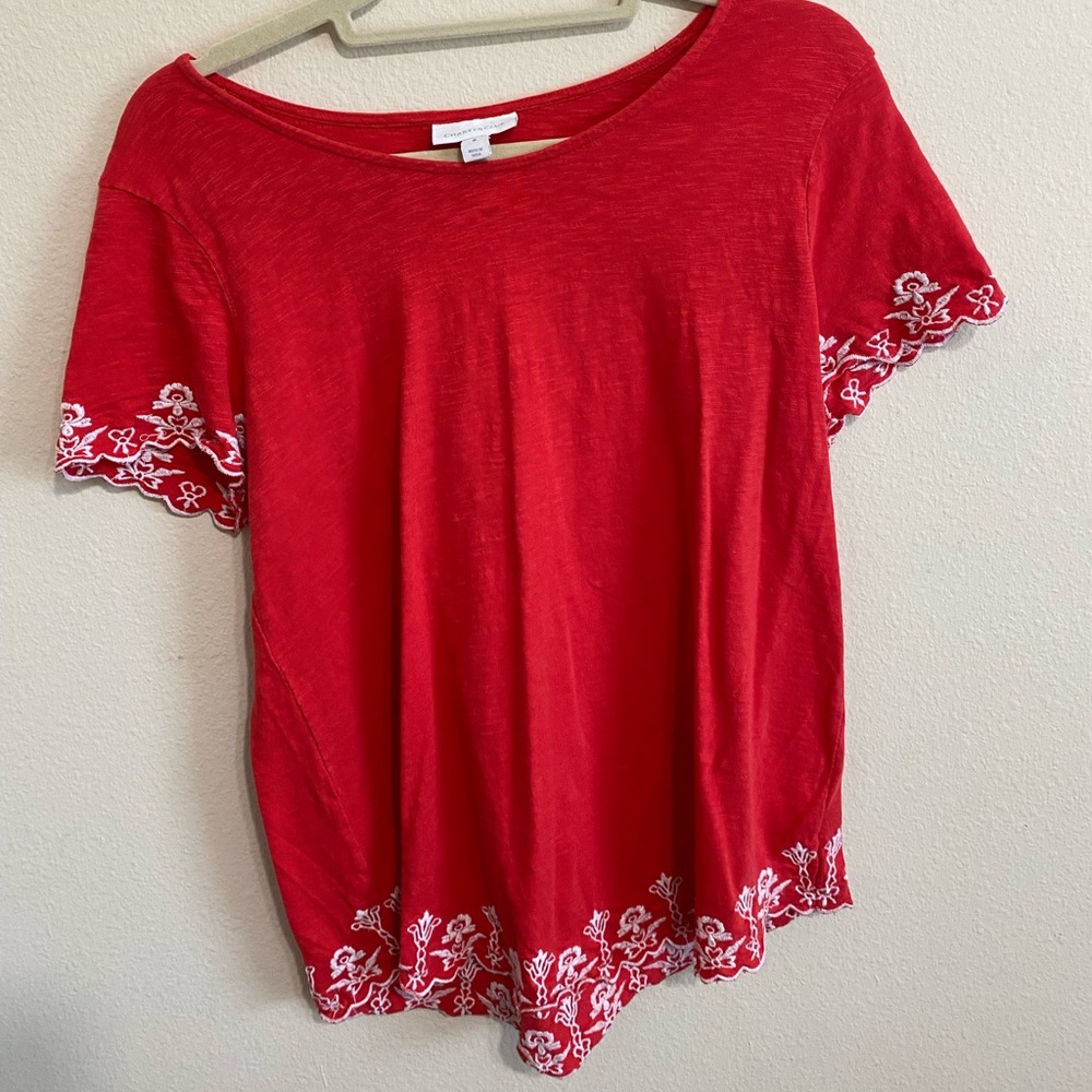 Red shirt with flower details